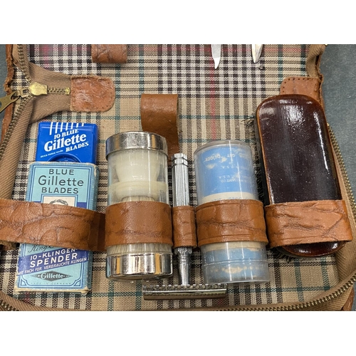 202 - A VINTAGE GENTS LEATHER VANITY CASE WITH CONTENTS