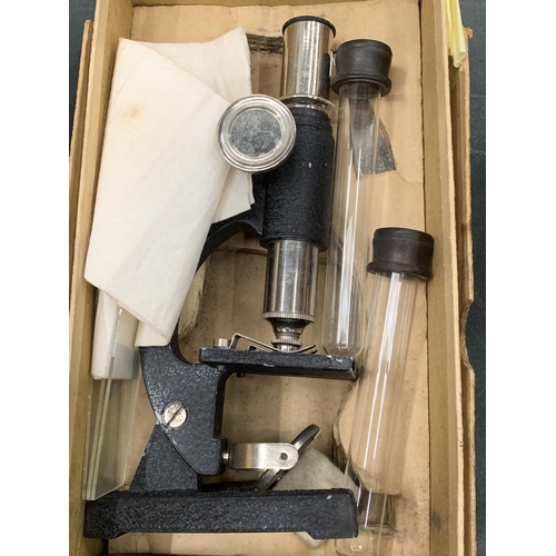 205 - A VINTAGE STUDENT'S MICROSCOPE COMPLETE WITH SLIDES AND SPECIMEN TUBES (UNUSED) TOGETHER WITH TWO TI... 