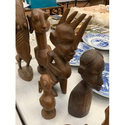 232 - SEVERAL AFRICAN HAND SCULPTURED FIGURES