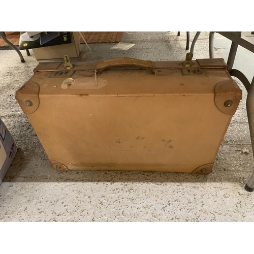 245A - A VINTAGE LEATHER SUITCASE