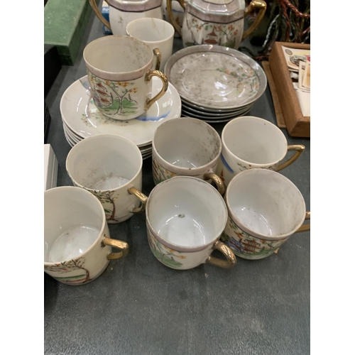 249 - AN ORIENTAL STYLE COFFEE SET TO INCLUDE COFFEE POTS, CREAM JUGS, SUGAR BOWLS, CUPS AND SAUCERS, ETC