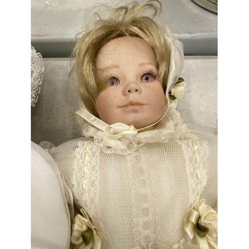 258 - THREE LARGE CINDY M McCLURE VINTAGE STYLE DOLLS WITH PORCELAIN HEADS, ARMS AND LEGS AND CLOTH BODIES