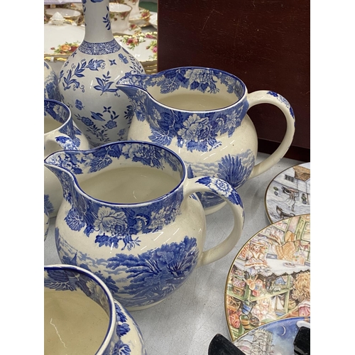 261 - A LARGE QUANTITY OF VINTAGE BLUE AND WHITE POTTERY TO INCLUDE JUGS, BOWLS, CUPS, ETC