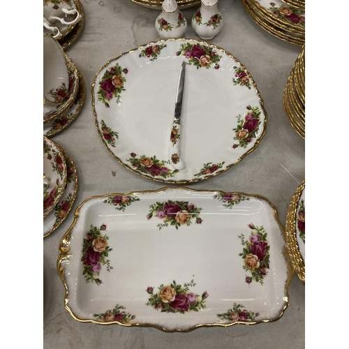 826 - A LARGE ROYAL ALBERT OLD COUNTRY ROSES TEA SET COMPRISING TEA POT, PLATES, CUPS, SAUCERS ETC