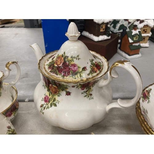 826 - A LARGE ROYAL ALBERT OLD COUNTRY ROSES TEA SET COMPRISING TEA POT, PLATES, CUPS, SAUCERS ETC