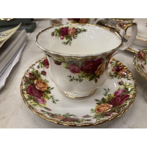 826 - A LARGE ROYAL ALBERT OLD COUNTRY ROSES TEA SET COMPRISING TEA POT, PLATES, CUPS, SAUCERS ETC