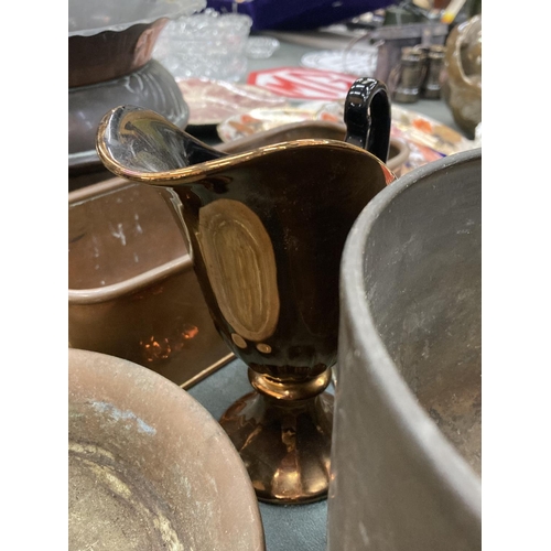 292 - A LARGE QUANTITY OF BRASS AND COPPER ITEMS TO INCLUDE VASES, PLANTERS, PLATES, BOWLS, ETC