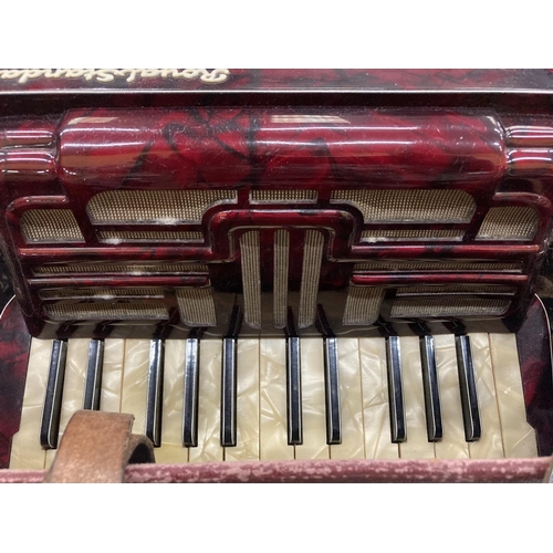 353 - A VINTAGE ROYAL STANDARD ACCORDIAN WITH RED BAKELITE BODY IN THE ORIGINAL CASE