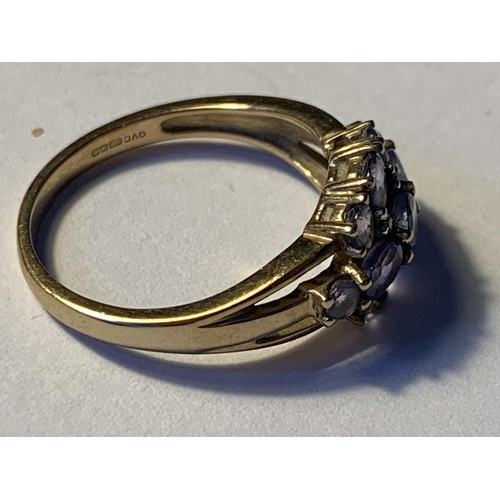 502 - A 9 CARAT GOLD RING WITH AMETHYSTS AND DIAMONDS SIZE N/O