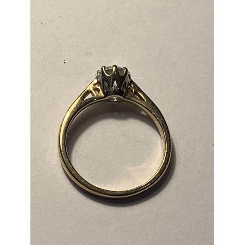 517 - A 9 CARAT GOLD RING WITH A SOLITAIRE CUBIC ZIRCONIA SIZE J/K