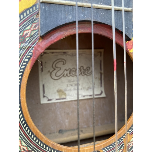 1770 - A PAINTED ENCORE ACOUSTIC GUITAR