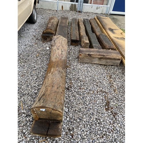 1982 - AN ASSORTMENT OF OAK BEAMS AND MANTLE PIECES