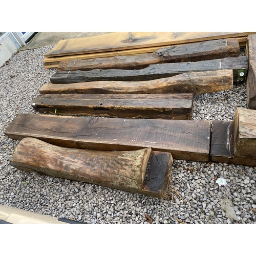 1982 - AN ASSORTMENT OF OAK BEAMS AND MANTLE PIECES