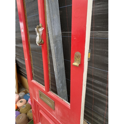 1998 - A WOODEN EXTERNAL DOOR WITH BRASS LETTER BOX AND KNOCKER