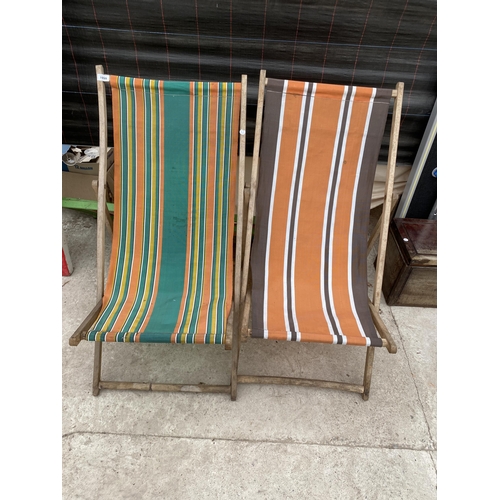 1999 - THREE RETRO WOODEN FOLDING DECK CHAIRS