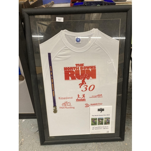 897 - THREE FRAMED AND GLAZED WINNERS SHIRTS AND MEDALS FROM THE NORTH DOWNS RUNS