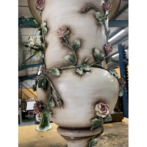 477 - A LARGE CERAMIC URN SHAPED PLANTER WITH CLIMBING ROSE DECORATION HEIGHT 67CM