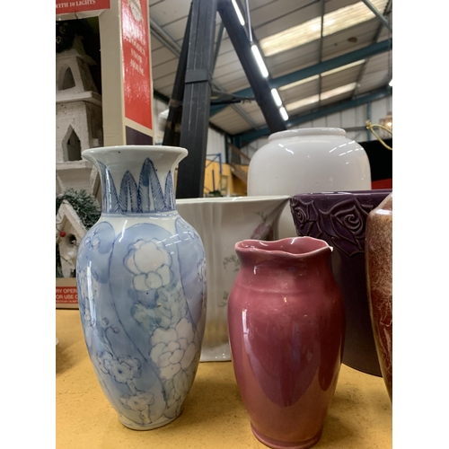 479 - A QUANTITY OF VASES AND PLANTERS