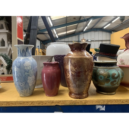 479 - A QUANTITY OF VASES AND PLANTERS