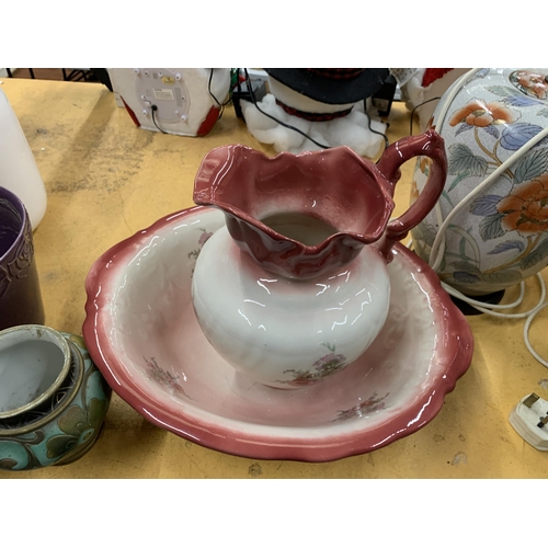 480 - A VINTAGE EMPRESS IRONSTONE WASHBOWL AND JUG WITH ROSE DECORATION