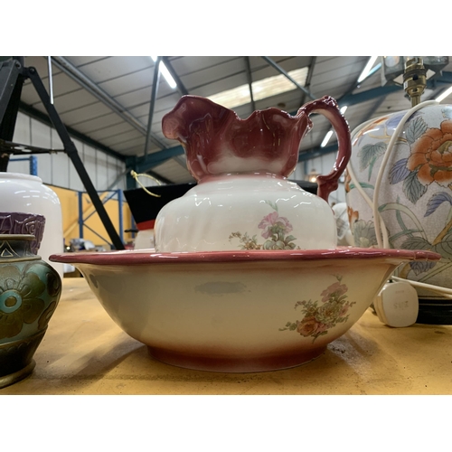 480 - A VINTAGE EMPRESS IRONSTONE WASHBOWL AND JUG WITH ROSE DECORATION