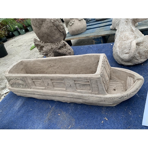 72 - A LARGE CONCRETE PLANTER IN THE FORM OF A BARGE 80CM LONG NO VAT