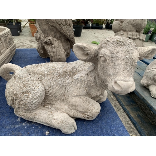 74 - A CONCRETE GARDEN ORNAMENT IN THE FORM OF A CALF