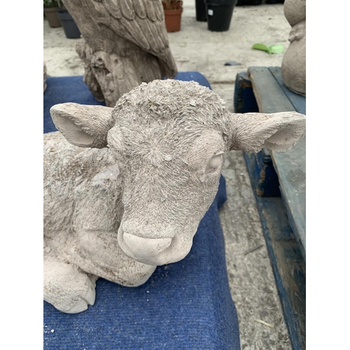 74 - A CONCRETE GARDEN ORNAMENT IN THE FORM OF A CALF