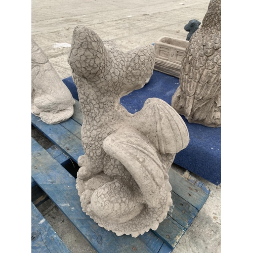 75 - A CONCRETE GARDEN ORNAMENT IN THE FORM OF A DRAGON SITTING ON AN EGG NO VAT