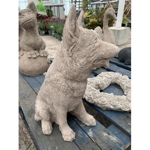 76 - A CONCRETE GARDEN ORNAMENT IN THE FORM OF A GERMAN SHEPHARD NO VAT