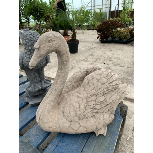 82 - A LARGE CONCRETE GARDEN ORNAMENT IN THE FORM OF SWAN NO VAT