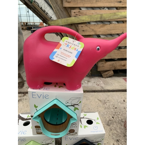 83 - THREE NEW AND BOXED SINGING FRIEND EVIE BIRD FEEDERS AND A KIDS FUN CAN IN THE FORM OF A PINK ELEPHA... 