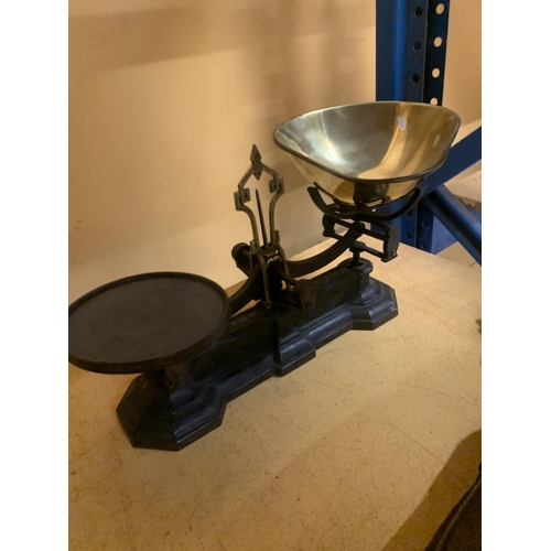 391 - A SET OF VINTAGE CAST AND BRASS SHOP SCALES