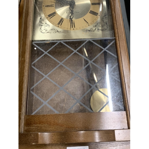 460 - A VINTAGE STYLE MAHOGANY WALL CLOCK WITH PENDULUM