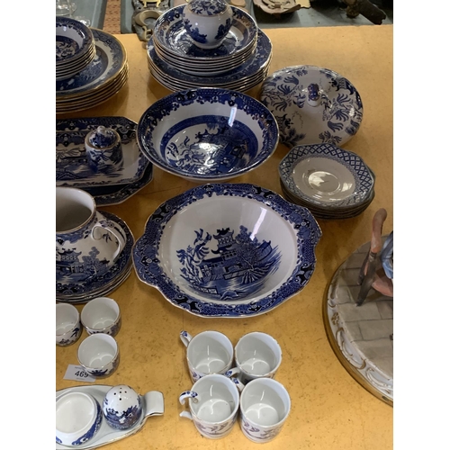 469 - A LARGE PART BURLEIGHWARE 'WILLOW PATTERN' DINNER SERVICE TO INCLUDE VARIOUS SIZES OF PLATES, BOWLS,... 