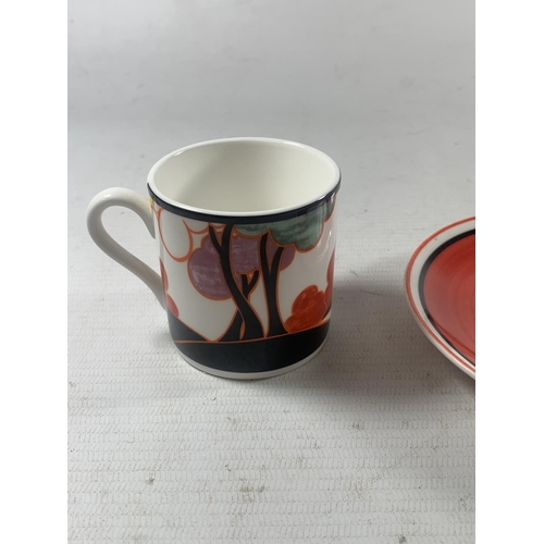 724 - A LIMITED EDITION WEDGEWOOD CUP AND SAUCER  AUTUMN