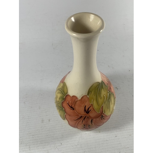 735 - A MOORCROFT HIBISCUS VASE