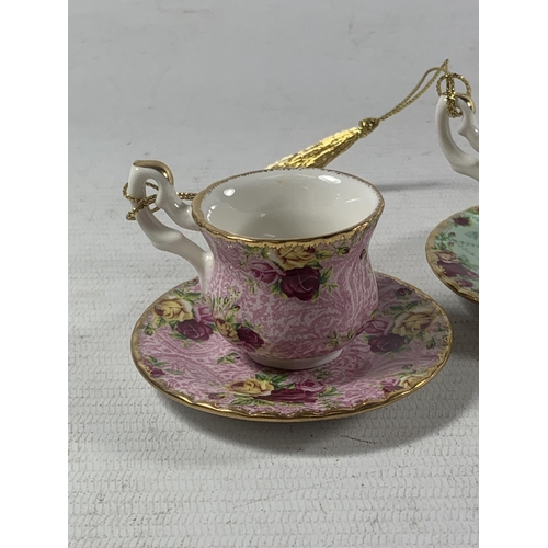 752 - TWO ROYAL ALBERT BOXED MINATURE TEACUP AND SAUCER ORNAMENTS - DUSKY PINK AND PEPPERMINT