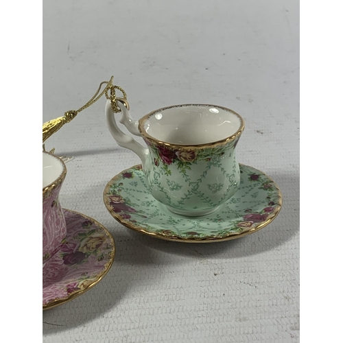 752 - TWO ROYAL ALBERT BOXED MINATURE TEACUP AND SAUCER ORNAMENTS - DUSKY PINK AND PEPPERMINT