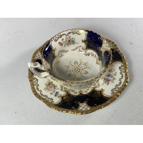 753 - A COALPORT BATWITN PANEL COBALT GOLD FLORAL CUP AND SAUCER