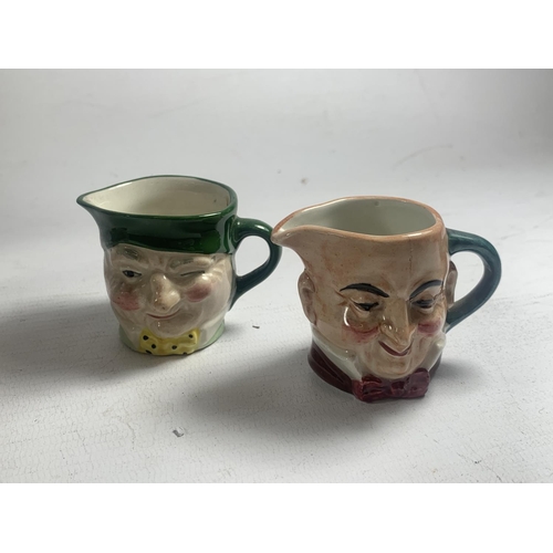 765 - FOUR TOBY JUGS TO INCLUDE TWO ROYAL DOULTON PIED PIPER