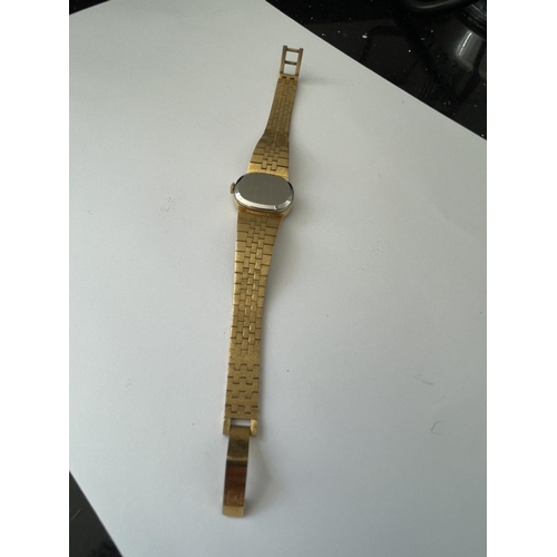 632 - A TISSOT WRISTWATCH WITH YELLOW METAL STRAP SEEN WORKING BUT NO WARRANTY