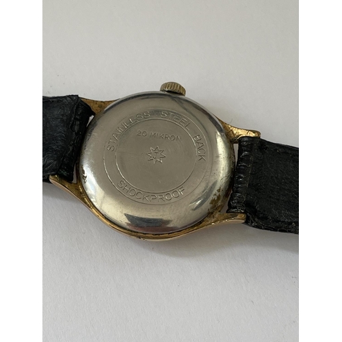 A 1960 S JUNGHANS 16 JEWEL WRIST WATCH WITH SUB DIAL AND BLACK