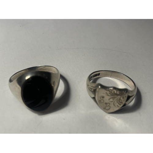 635A - FOUR HEAVY SILVER SIGNET RINGS