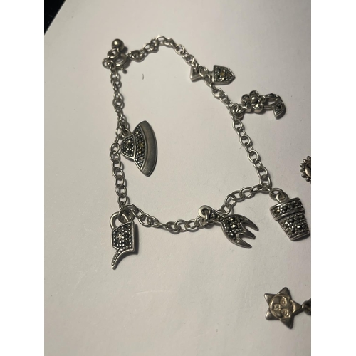 639A - THREE SILVER BRACELETS WITH CHARMS