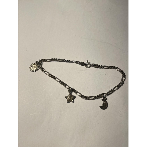 639A - THREE SILVER BRACELETS WITH CHARMS