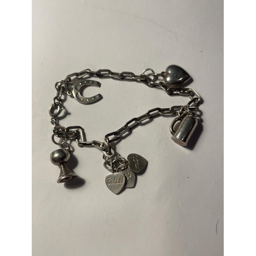 639A - THREE SILVER BRACELETS WITH CHARMS