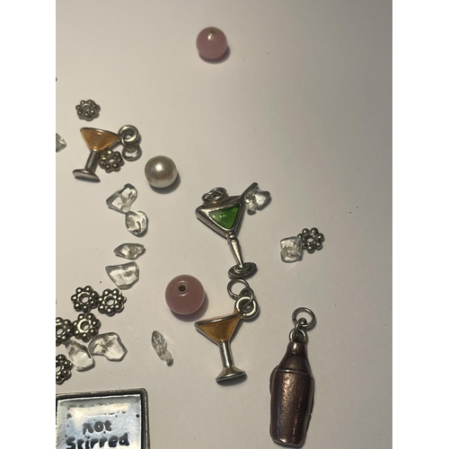 643 - VARIOUS COCKTAIL RELATED CHARMS AND BEADS