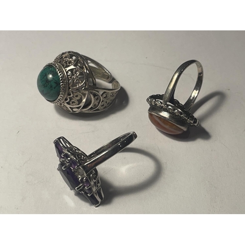 647A - THREE SILVER RINGS WITH LARGE SEMI PRECIOUS STONES