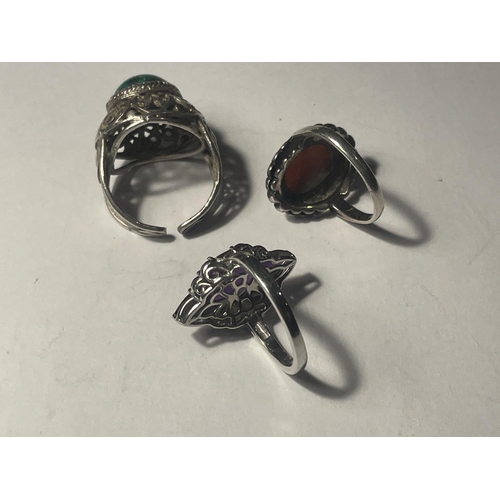 647A - THREE SILVER RINGS WITH LARGE SEMI PRECIOUS STONES